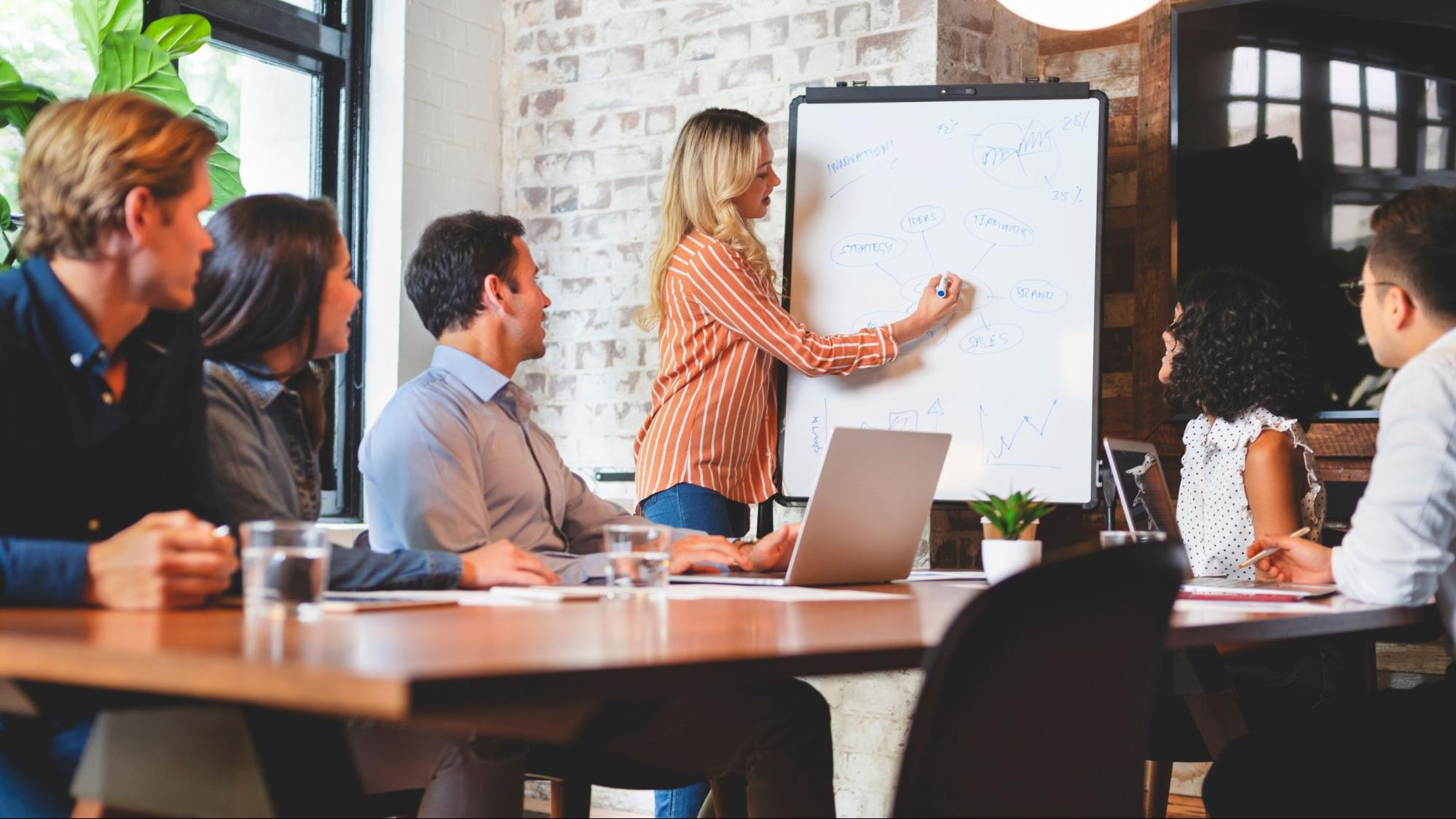 Startup vs Side Hustle: What Should You Choose in 2026? 2 Representation of a Startup - brainstorming, charts, or a rocket